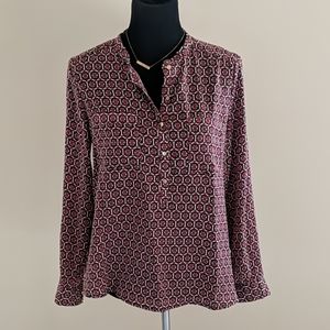 Geometric blouse with gold buttons